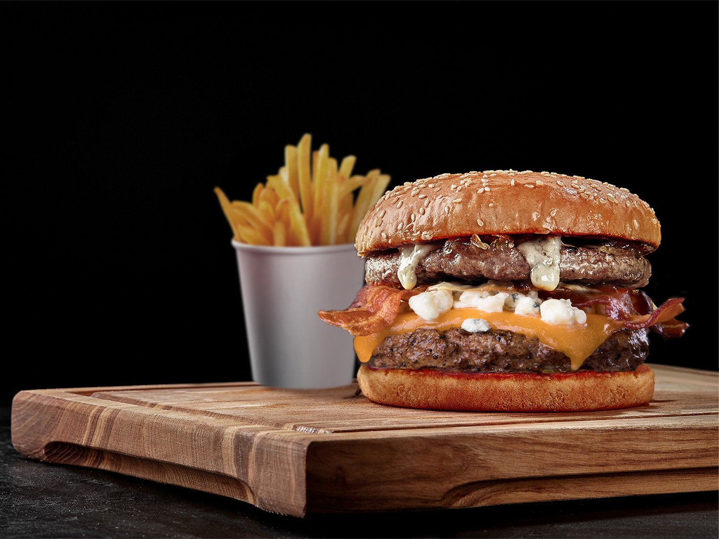 Half Pound Burger with Maytag Blue Cheese, Onion Jam and Peppered Bacon